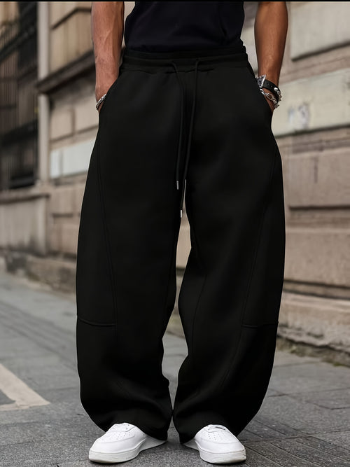 A Pair of Men'S Solid Color Wide-Leg Long Pants, Featuring a Trendy Design with an Elastic Waistband And Drawstring - Made of, Suitable for Casual Running, Sports, Fitness, And Outdoor Activities
